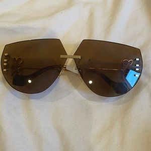 Brand New Loewe Sunglasses. Comes with case.